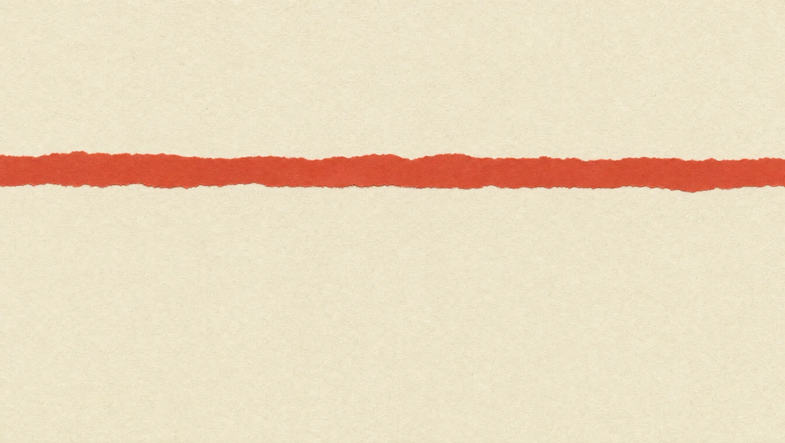 A sheet of paper with one torn red line across it.