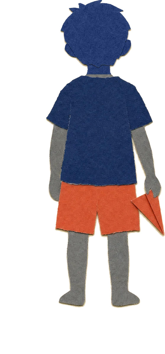 A paper child seen from behind, holding a folded paper plane.